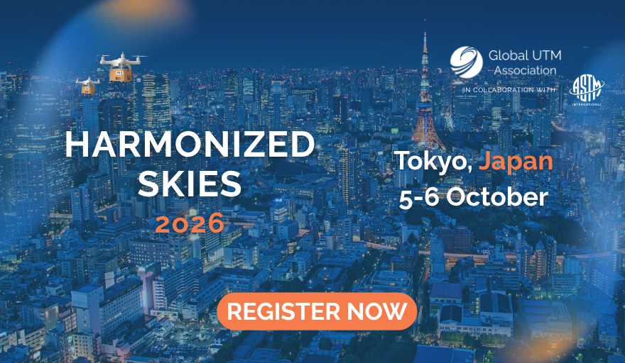 Night city skyline at dusk with drones delivering boxes; prominent text reads Harmonized Skies 2026, Tokyo, Japan, 5–6 October, and an orange Register Now button.